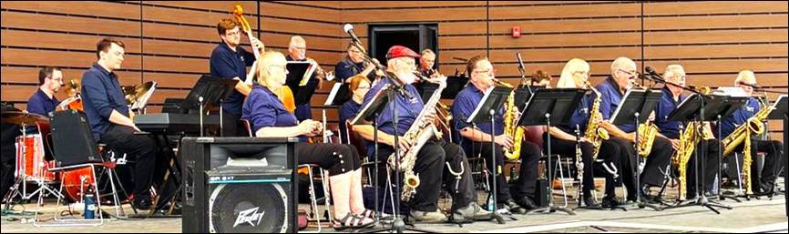 A group of people playing instruments
AI-generated content may be incorrect.